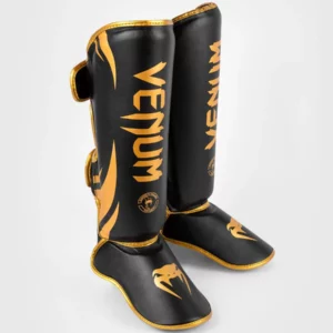 Black and gold shin pads